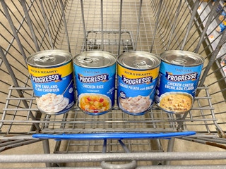 four progresso soup cans in walmart cart