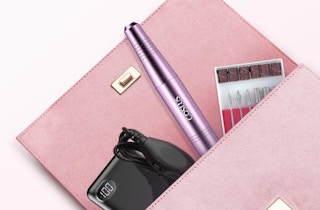 a electric nail drill kit in a pink pouch