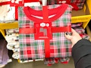 hand holding holiday time womens pajama set at walmart