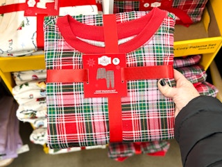 hand holding holiday time womens pajama set at walmart