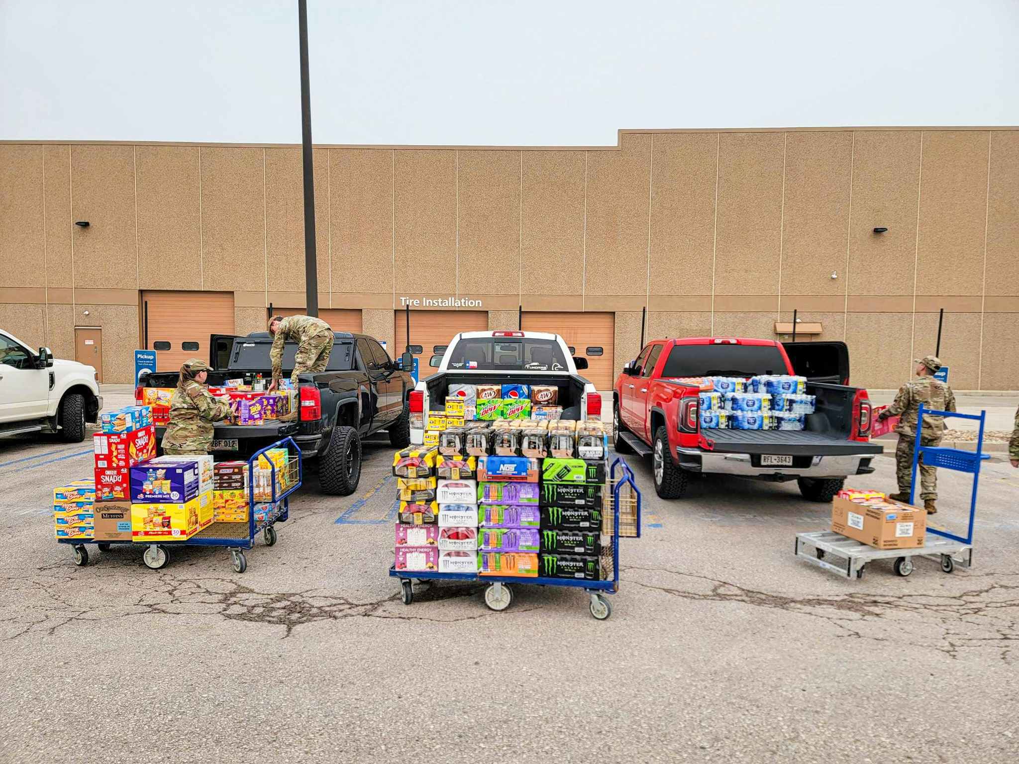 curbside pickup at sam's club trucks filling up with food