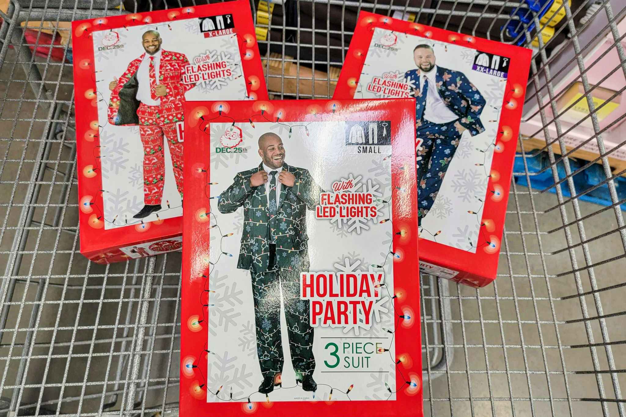 christmas suits in a cart