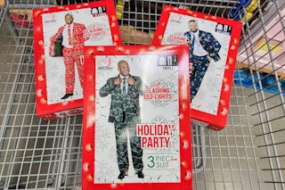 christmas suits in a cart