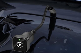 a wireless CarPlay plugged into a car