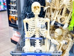 Way to Celebrate LED Skeleton in Walmart shopping cart in Halloween aisle