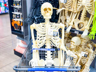 Way to Celebrate LED Skeleton in Walmart shopping cart in Halloween aisle
