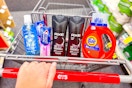 safeguard hand soap, crest toothpaste, axe body wash, and tide detergent in a cart
