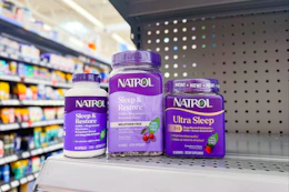 3 bottles of natrol sleep medication on a shelf
