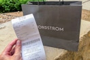 Nordstrom receipt held up in front of bag
