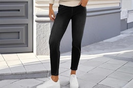 Woman wearing the Copyleaf Woman's Jeggings in black.