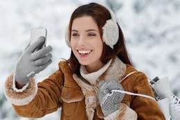a woman wearing thermal glove