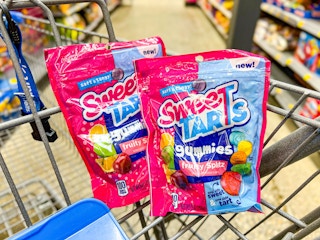 two packages of Sweetarts gummies in Walmart cart