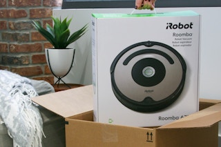 robot roomba coming out of box