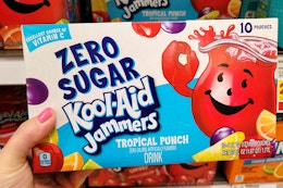 hand holding a box of kool-aid jammers drinks