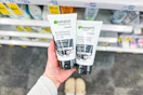 hand holding garnier blackhead scrubs in cvs