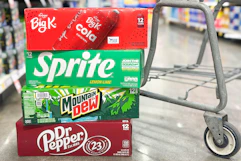 kroger soda 12 packs in store floor by shopping cart