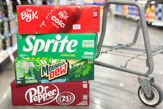 kroger soda 12 packs in store floor by shopping cart