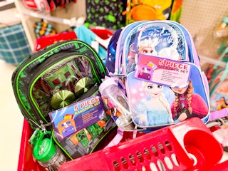 backpack sets sitting in a target cart