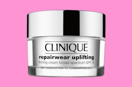 a clinique cream on a pink background