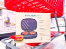 bella indoor grill sitting on the bottom of a target cart
