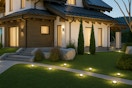AI image created by ChatGPT of the Euur Solar Ground Lights 12-pack used to light pathway to home