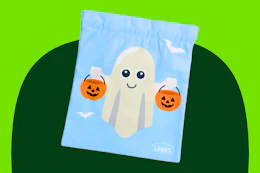 lowes members freebie halloween trick-or-treat bag with a little ghost holding two pumpkins
