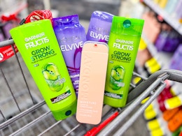 garnier, monday, and loreal haircare products in a cart