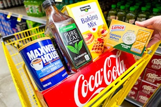 clover valley, pure leaf, maxwell house, coca-cola, lance products in a yellow dollar general shopping cart