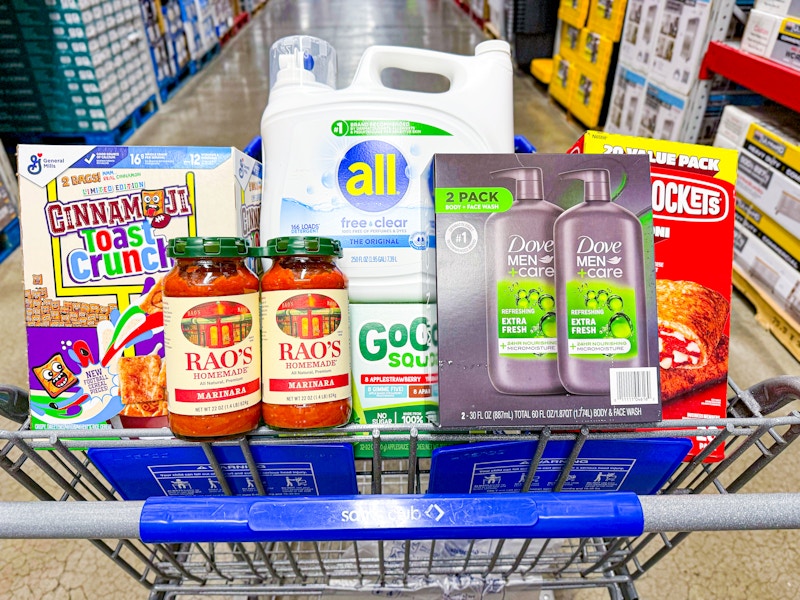 cereal, detergent, body wash,  hot pockets, pasta sauce, and applesauce in a cart