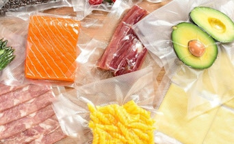 food seeled into vacuum sealer bags