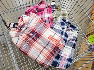 four plaid gap flannel ladies' shirts in a cart