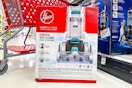 Hoover Smartwash Automatic Carpet Cleaner in aisle of store