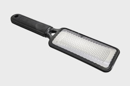 a foot file on a grey background