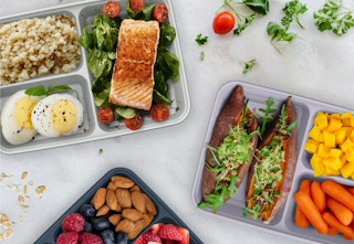 meal prep containers with food in them