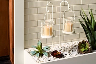 Lifestyle image of Magnolia (Hearth & Hand) Outdoor Stake Candle Lanterns