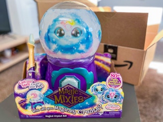 magix mixies magical misting crystal ball with pink blush toy near amazon box