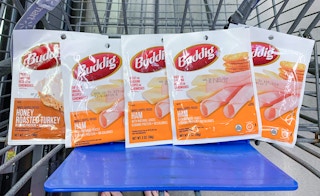 five packets of buddig lunch meat in a walmart cart