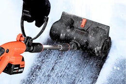 Lifestyle image (close up shot) of a Voltask Snow Shovel