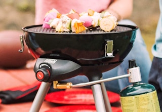 coleman stove used to grill food