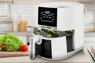 Lifestyle image from walmart.com of Kalorik Air Fryer being used in kitchen