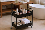 a rolling cart in a bathroom