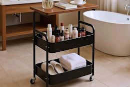 a rolling cart in a bathroom