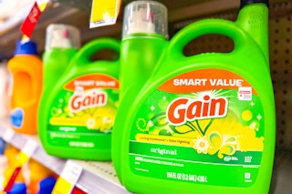 large bottles of gain detergent on a shelf