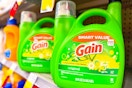large bottles of gain detergent on a shelf