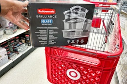 hand holding a rubbermaid brilliance glass set on a target cart