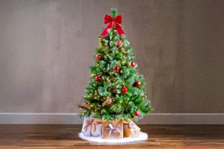 Lifestyle image of Noble House Pre-lit Artificial Christmas Tree 