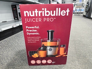 a nutribullet juicer box on the floor of a store