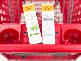two boxes of Burt's Bees toothpaste in Target shopping cart