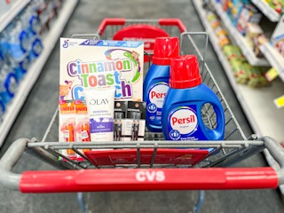 cvs shopping cart with maybelline, covergirl, general mills, persil, and olay products