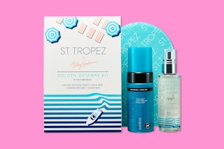 St. Tropez Self Tan Kit on a pink background.